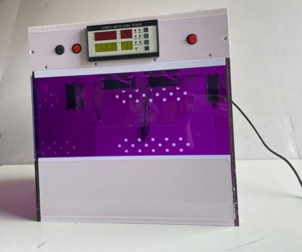 A purple machine with buttons and a clock on it.