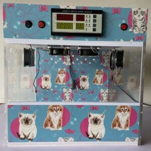 A small machine with cats on it