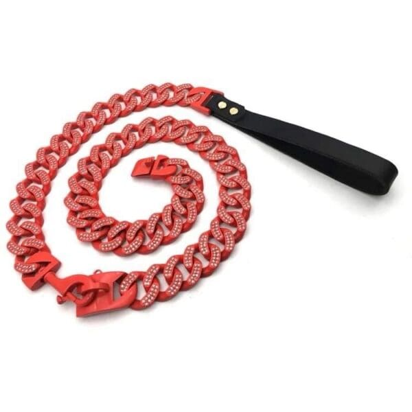 A red chain with black handle on white background.